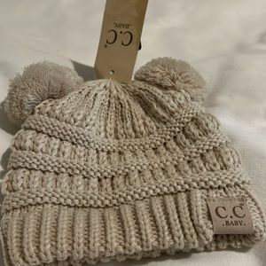 New with tags, cream colored infant baby beanie